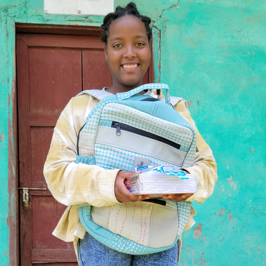 A Backpack Filled With Supplies For A Student